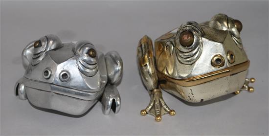 Frank Meisler, two metal frogs